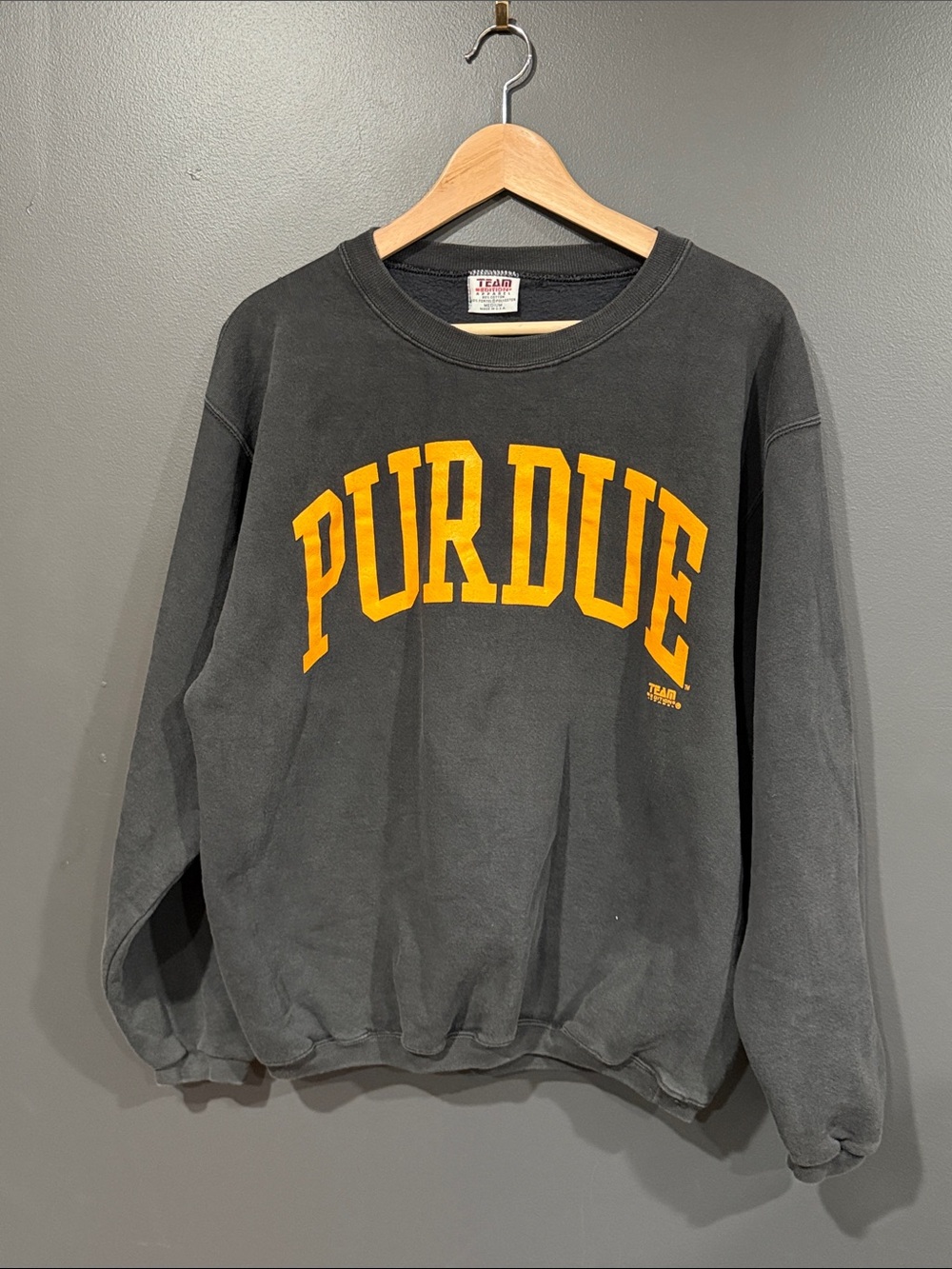 Purdue Black Crewneck Sweatshirt with Gold Arch Logo